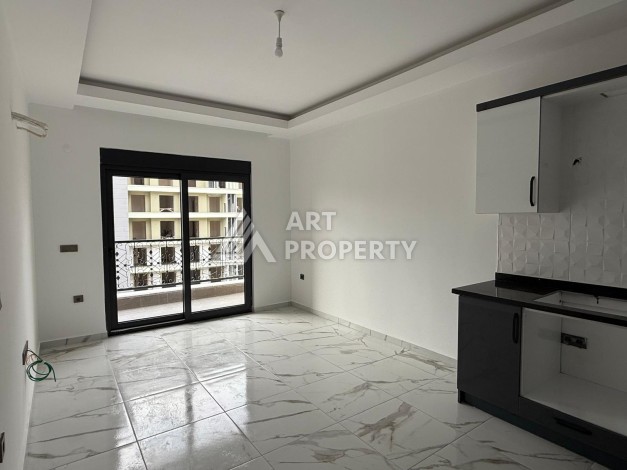 Квартиры 1+1 в центре Махмутлара, 47 кв.м. До моря всего 5 минут. - Ракурс 5