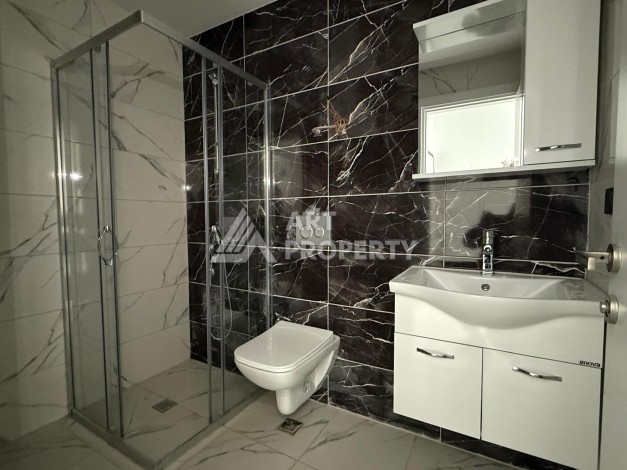 Квартиры 1+1 в центре Махмутлара, 47 кв.м. До моря всего 5 минут. - Ракурс 8