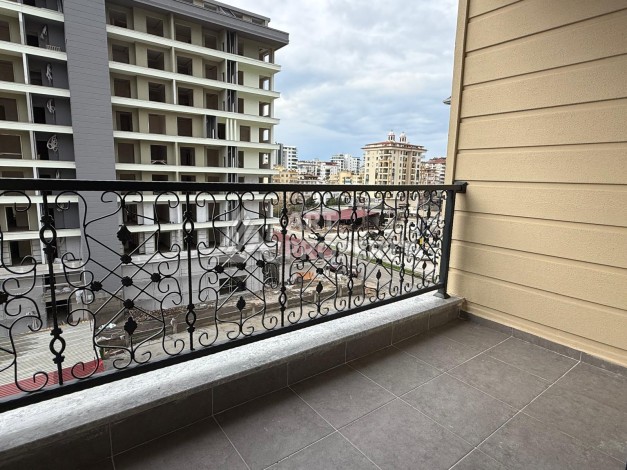 Квартиры 1+1 в центре Махмутлара, 47 кв.м. До моря всего 5 минут. - Ракурс 9