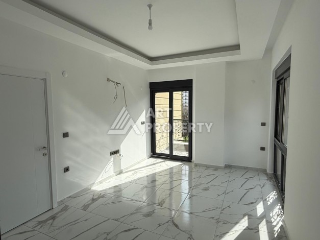 Квартиры 1+1 в центре Махмутлара, 47 кв.м. До моря всего 5 минут. - Ракурс 10