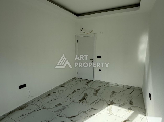 Квартиры 1+1 в центре Махмутлара, 47 кв.м. До моря всего 5 минут. - Ракурс 12