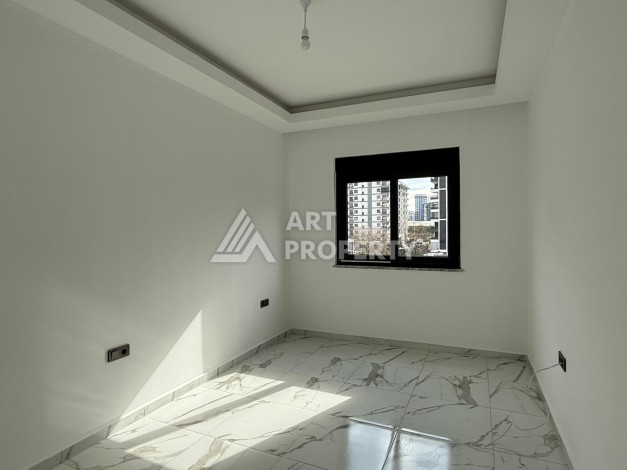 Квартиры 1+1 в центре Махмутлара, 47 кв.м. До моря всего 5 минут. - Ракурс 13