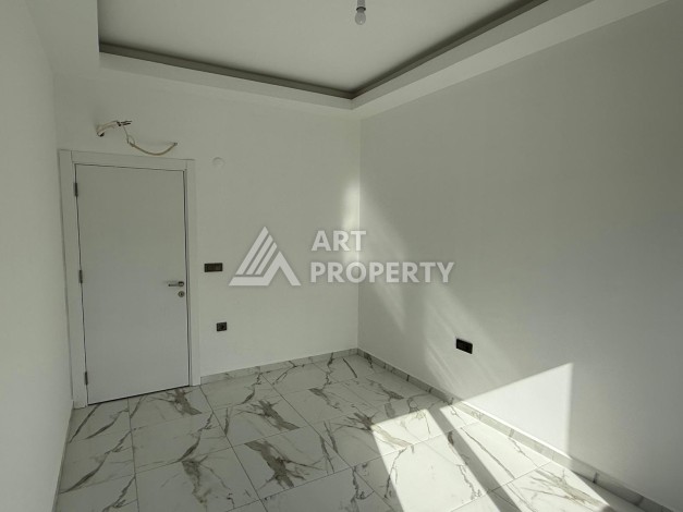 Квартиры 1+1 в центре Махмутлара, 47 кв.м. До моря всего 5 минут. - Ракурс 14