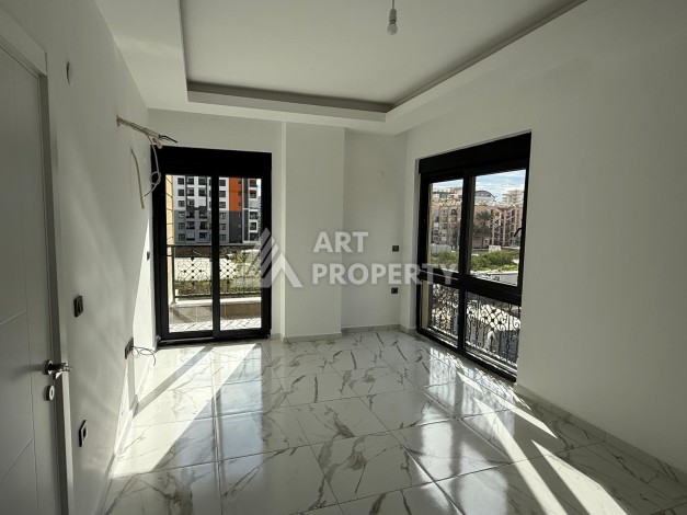 Квартиры 1+1 в центре Махмутлара, 47 кв.м. До моря всего 5 минут. - Ракурс 16