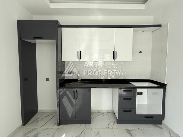 Квартиры 1+1 в центре Махмутлара, 47 кв.м. До моря всего 5 минут. - Ракурс 17