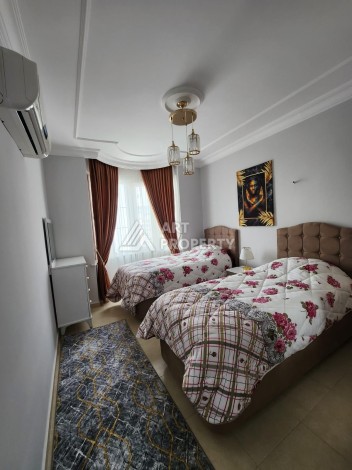 Просторная квартира 2+1 с мебелью в 350 метрах от моря в Махмутларе - Ракурс 23