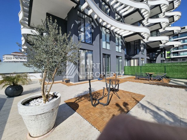 Стильный лофт 1+1 с большой террасой и барбекю в Каргыджаке, 208 кв.м. - Ракурс 45