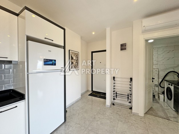 Квартира 1+1 с панорамным видом и мебелью в Авсалларе, 55 кв.м. - Ракурс 9