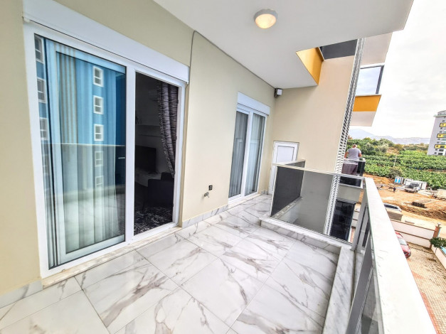 Двухкомнатная меблированная квартира на расстоянии 600 метров от Средиземного моря, район Махмутлар, Алания 60 м2 - Ракурс 16