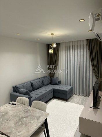 Квартира 1+1 в элитном ЖК с собственным пляжем в центре Алании, 50 кв.м. - Ракурс 6