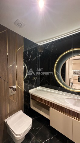 Квартира 1+1 в элитном ЖК с собственным пляжем в центре Алании, 50 кв.м. - Ракурс 9