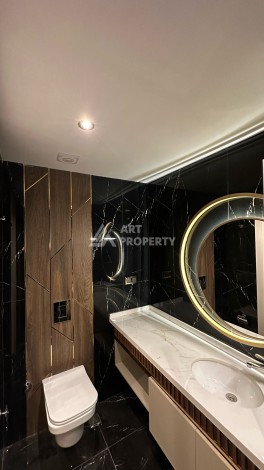 Квартира 1+1 в элитном ЖК с собственным пляжем в центре Алании, 50 кв.м. - Ракурс 11