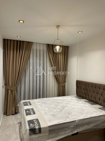 Квартира 1+1 в элитном ЖК с собственным пляжем в центре Алании, 50 кв.м. - Ракурс 12