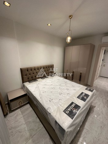 Квартира 1+1 в элитном ЖК с собственным пляжем в центре Алании, 50 кв.м. - Ракурс 13