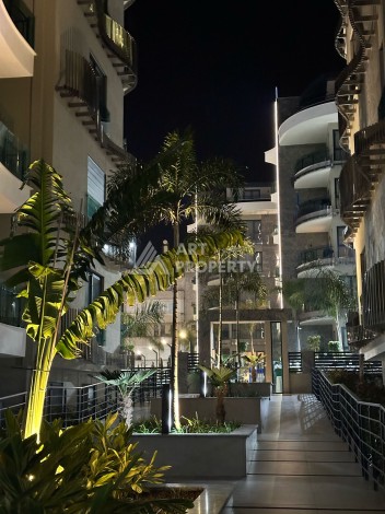 Квартира 1+1 в элитном ЖК с собственным пляжем в центре Алании, 50 кв.м. - Ракурс 20