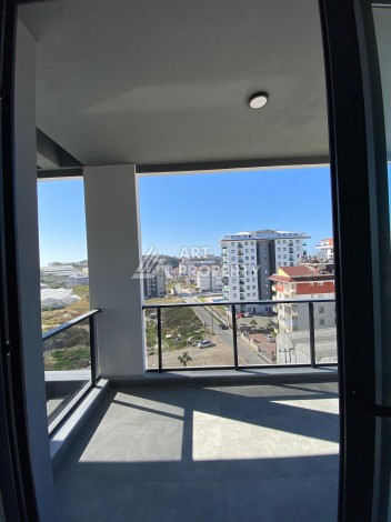 Две квартиры 2+1 в престижной новой резиденции в Авсалларе, 101 кв.м. - Ракурс 21