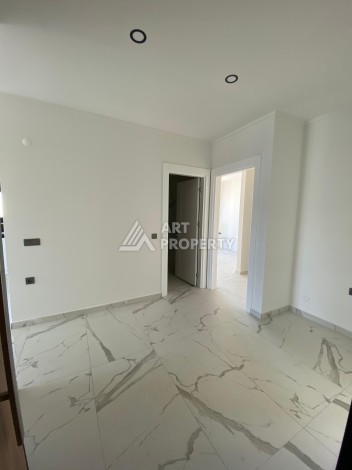 Две квартиры 2+1 в престижной новой резиденции в Авсалларе, 101 кв.м. - Ракурс 27