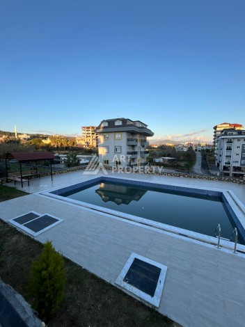 Уютная квартира 1+1 в новом жилом комплексе района Авсаллар, 58 кв.м. - Ракурс 11