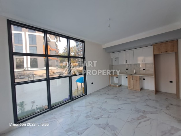 Квартира 1+1 с видом на бассейн в современном ЖК, 55 кв.м. Авсаллар, Алания - Ракурс 3