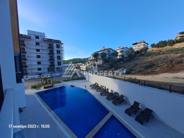 Квартира 1+1 с видом на бассейн в современном ЖК, 55 кв.м. Авсаллар, Алания - Ракурс 10