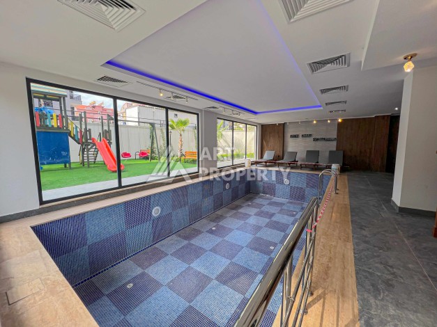 Квартира 1+1 с видом на бассейн в современном ЖК, 55 кв.м. Авсаллар, Алания - Ракурс 14