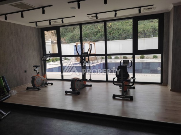 Квартира 1+1 с видом на бассейн в современном ЖК, 55 кв.м. Авсаллар, Алания - Ракурс 16