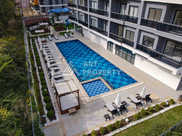 Квартира 1+1 с видом на бассейн в современном ЖК, 55 кв.м. Авсаллар, Алания - Ракурс 21