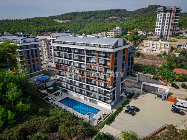 Квартира 1+1 с видом на бассейн в современном ЖК, 55 кв.м. Авсаллар, Алания - Ракурс 22