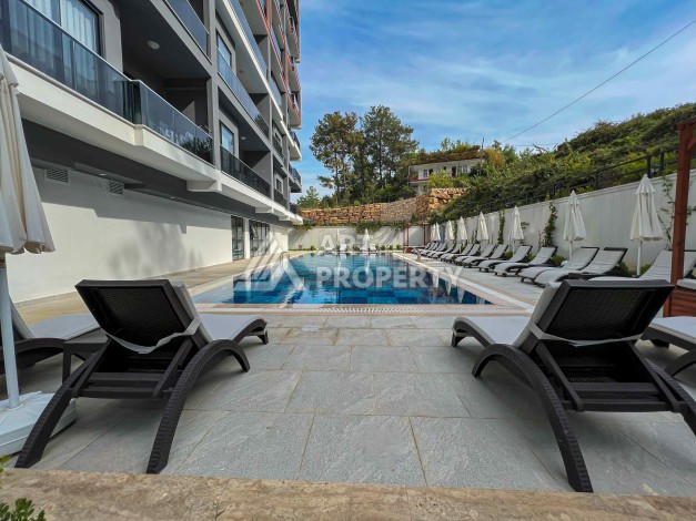 Квартира 1+1 с видом на бассейн в современном ЖК, 55 кв.м. Авсаллар, Алания - Ракурс 24