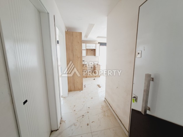 Просторная квартира 1+1 в экологически чистом районе Авсаллар, 64 кв.м. - Ракурс 2