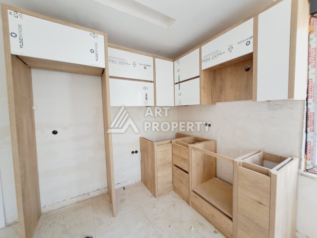 Просторная квартира 1+1 в экологически чистом районе Авсаллар, 64 кв.м. - Ракурс 4