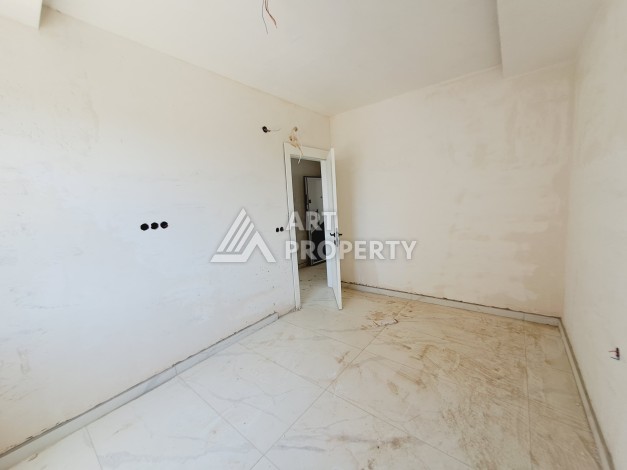 Просторная квартира 1+1 в экологически чистом районе Авсаллар, 64 кв.м. - Ракурс 5