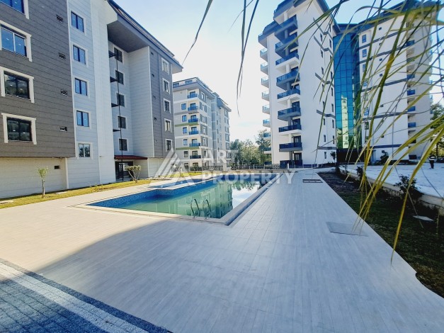 Просторная квартира 1+1 в экологически чистом районе Авсаллар, 64 кв.м. - Ракурс 14