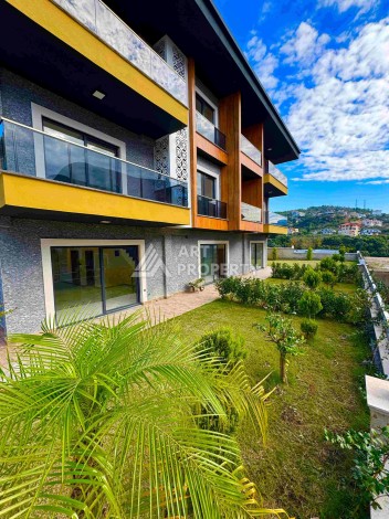 Двухуровневые апартаменты 2+1 и 3+1 с садом и террасой в центре Алании, Буюкхасбахче. - Ракурс 6