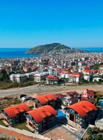 Двухуровневые апартаменты 2+1 и 3+1 с садом и террасой в центре Алании, Буюкхасбахче. - Ракурс 18