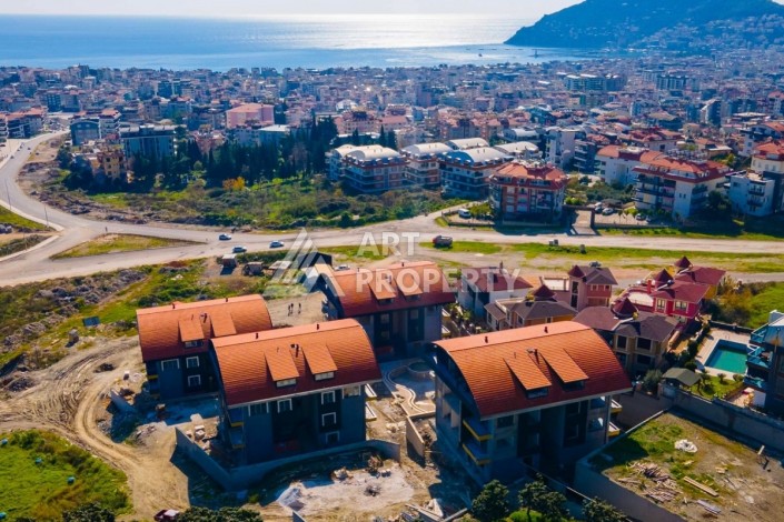 Двухуровневые апартаменты 2+1 и 3+1 с садом и террасой в центре Алании, Буюкхасбахче. - Ракурс 24