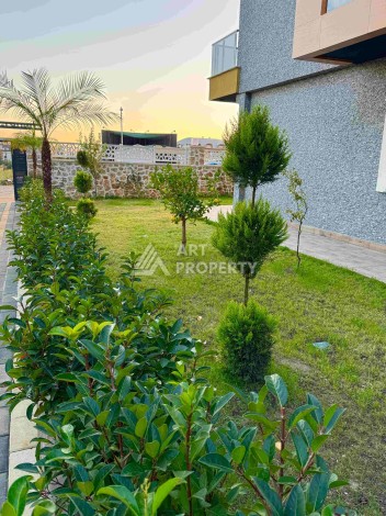 Двухуровневые апартаменты 2+1 и 3+1 с садом и террасой в центре Алании, Буюкхасбахче. - Ракурс 30