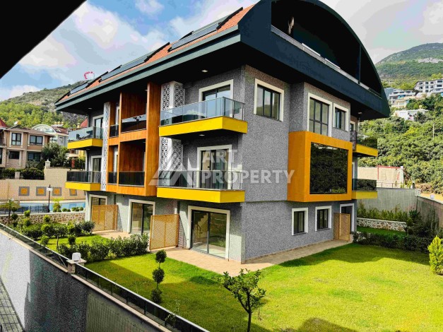 Двухуровневые апартаменты 2+1 и 3+1 с садом и террасой в центре Алании, Буюкхасбахче. - Ракурс 39