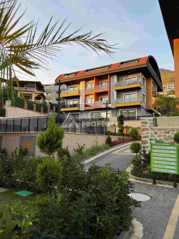 Двухуровневые апартаменты 2+1 и 3+1 с садом и террасой в центре Алании, Буюкхасбахче. - Ракурс 40