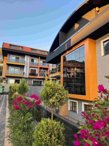 Двухуровневые апартаменты 2+1 и 3+1 с садом и террасой в центре Алании, Буюкхасбахче. - Ракурс 45