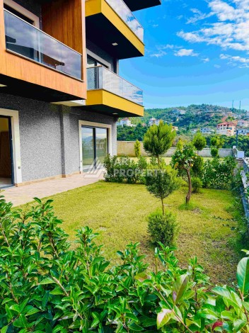 Двухуровневые апартаменты 2+1 и 3+1 с садом и террасой в центре Алании, Буюкхасбахче. - Ракурс 47