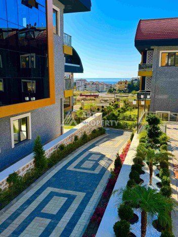 Двухуровневые апартаменты 2+1 и 3+1 с садом и террасой в центре Алании, Буюкхасбахче. - Ракурс 49