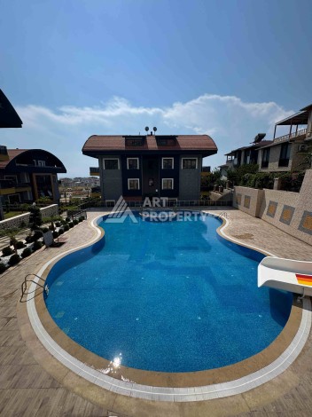 Двухуровневые апартаменты 2+1 и 3+1 с садом и террасой в центре Алании, Буюкхасбахче. - Ракурс 52