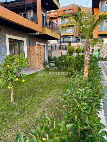 Двухуровневые апартаменты 2+1 и 3+1 с садом и террасой в центре Алании, Буюкхасбахче. - Ракурс 54