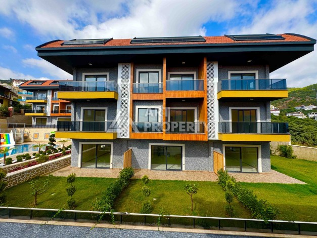 Двухуровневые апартаменты 2+1 и 3+1 с садом и террасой в центре Алании, Буюкхасбахче. - Ракурс 56