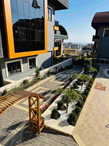 Двухуровневые апартаменты 2+1 и 3+1 с садом и террасой в центре Алании, Буюкхасбахче. - Ракурс 88