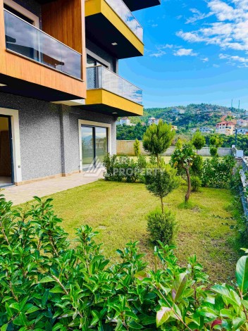 Двухуровневые апартаменты 2+1 и 3+1 с садом и террасой в центре Алании, Буюкхасбахче. - Ракурс 97