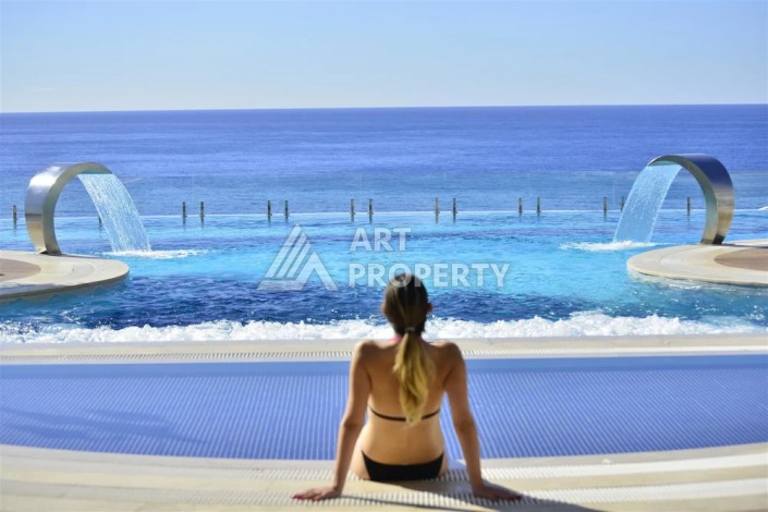 Эксклюзивные апартаменты 1+1 с головокружительным видом на Средиземное море, 98 кв.м. Конаклы, Алания - Ракурс 4