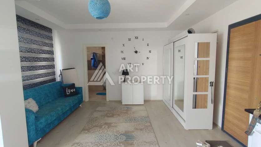 Срочная продажа! Уютная квартира 1+1 в Махмутларе. Всего 7 минут до пляжа. - Ракурс 3