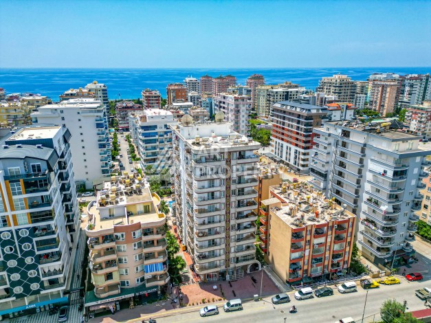 Светлая квартира 3+1 с видом на море в центре Махмутлара, 140 м² - Ракурс 2